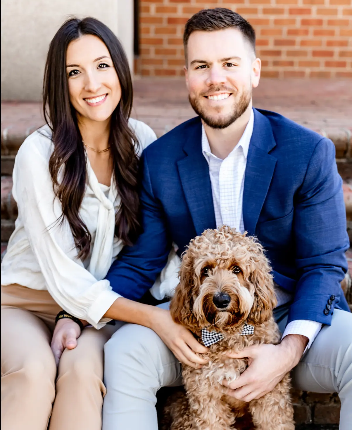 Dr. Tyler and Dr. Megan smilling at Axiom Chiropractic