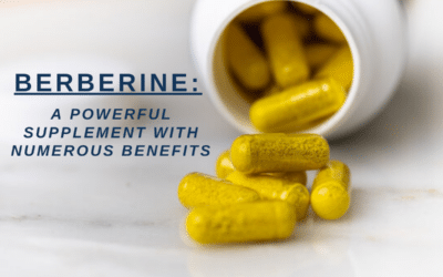 Berberine yellow pills pouring out of a bottle