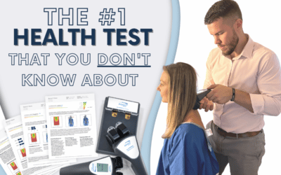 Dr. Tyler using insight NeuroPulse checking a patients subluxations